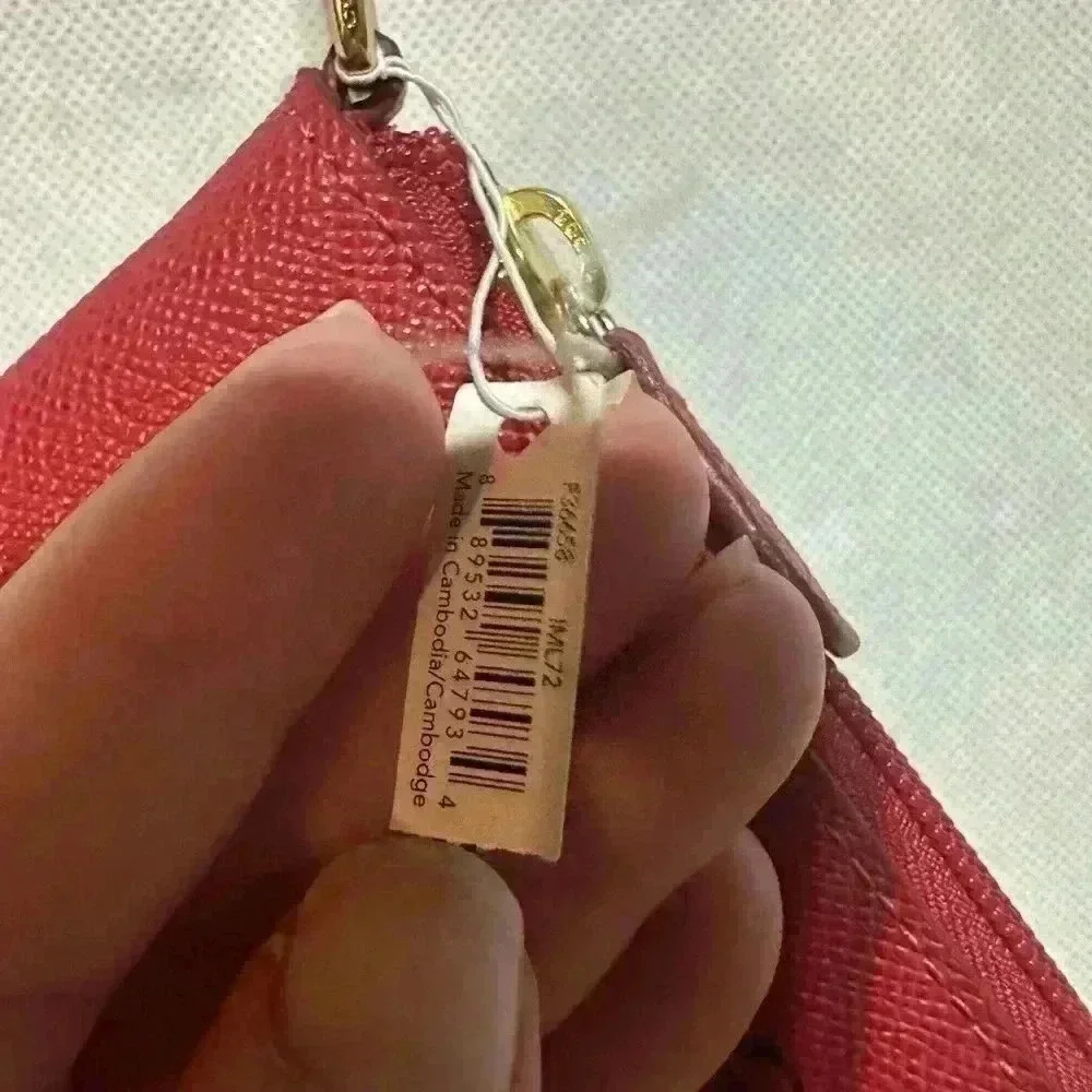 Coach story pouch